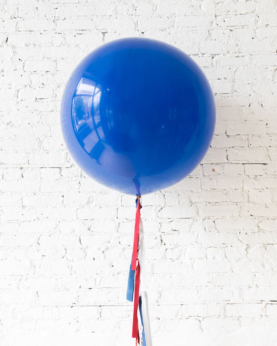 Dark Blue Giant Balloon and Red, White & Blue Palette Tassel | Purchase Dark Blue Giant Balloon and Red, White & Blue Palette Tassel | Purchase