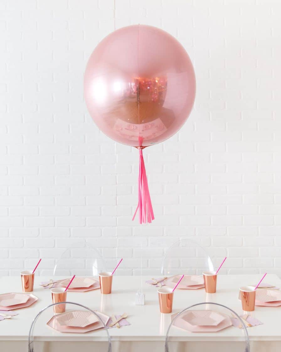 Life In Plastic 21in Rose Gold Orb Foil Balloon with Fuchsia Skirt Centerpiece | Rental Life In Plastic 21in Rose Gold Orb Foil Balloon with Fuchsia Skirt Centerpiece | Rental
