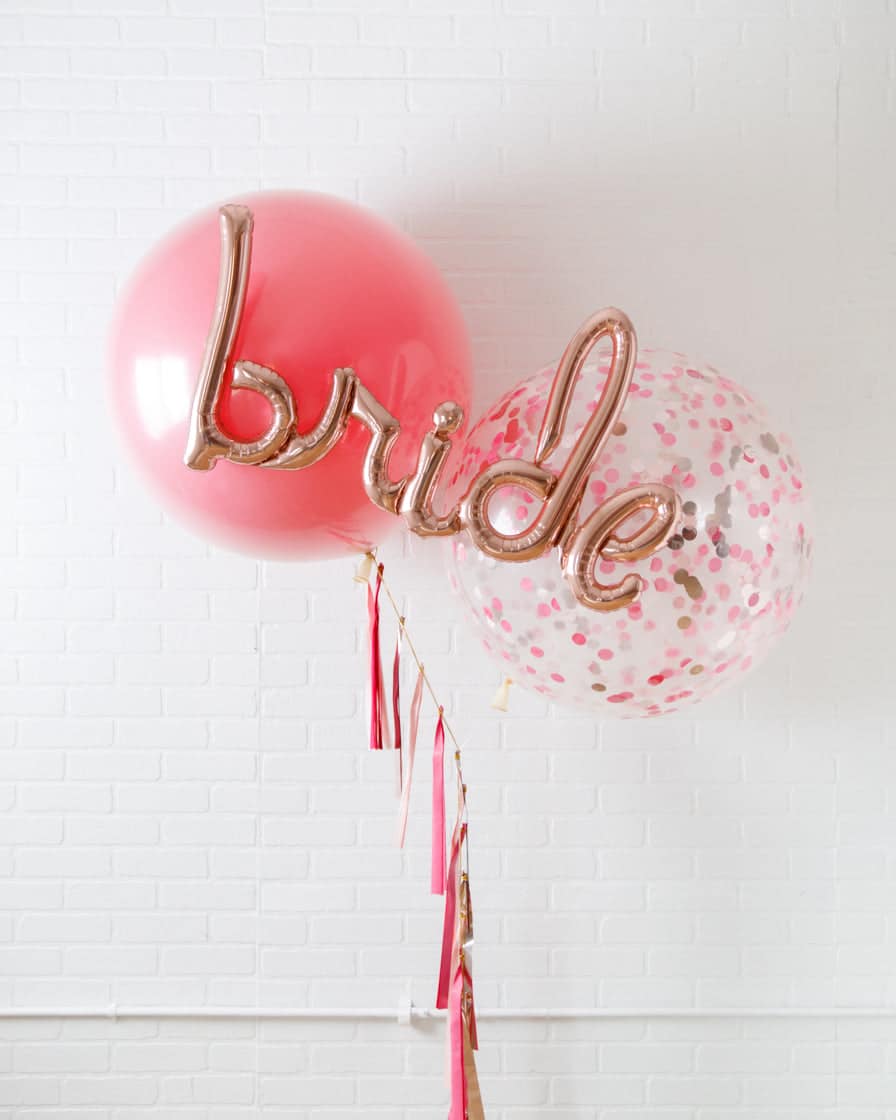 Life in Plastic – Giant Bouquet with Bride Script & Tassel | Rental